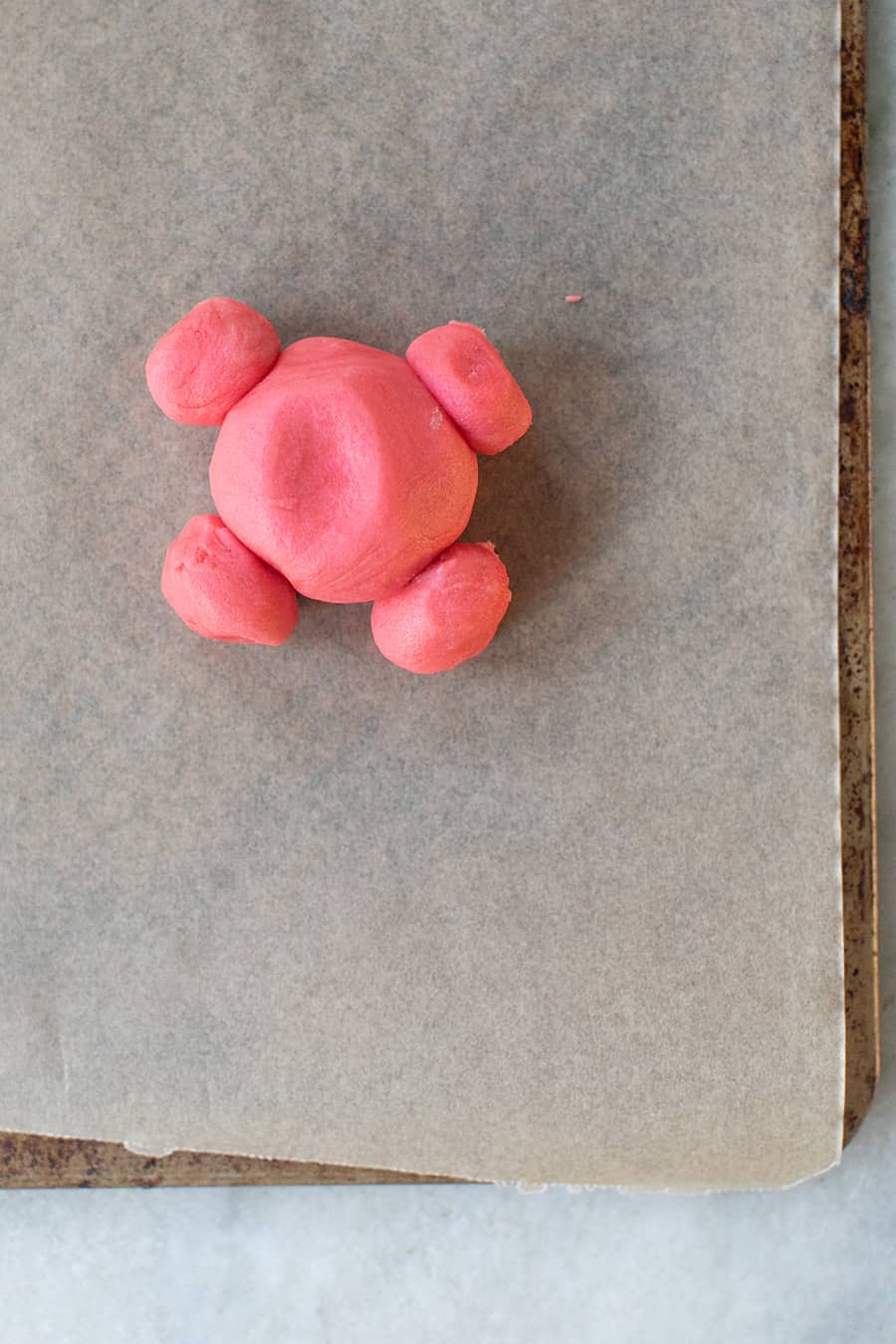 Making little Santa Cookies.