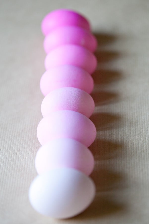 Ombre Easter eggs in pink going from light shades of pink to dark shades of pink.