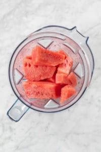 Watermelon cubes in a blender.
