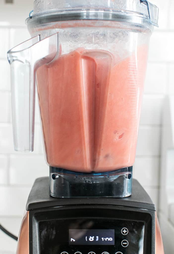 Blending watermelon in a blender to make juice. 