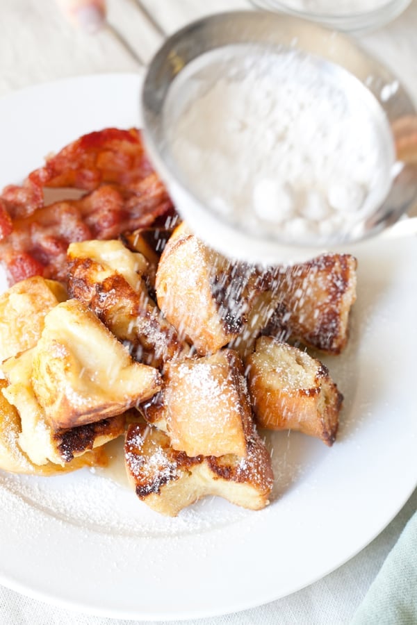 French toast puffs on a white plate