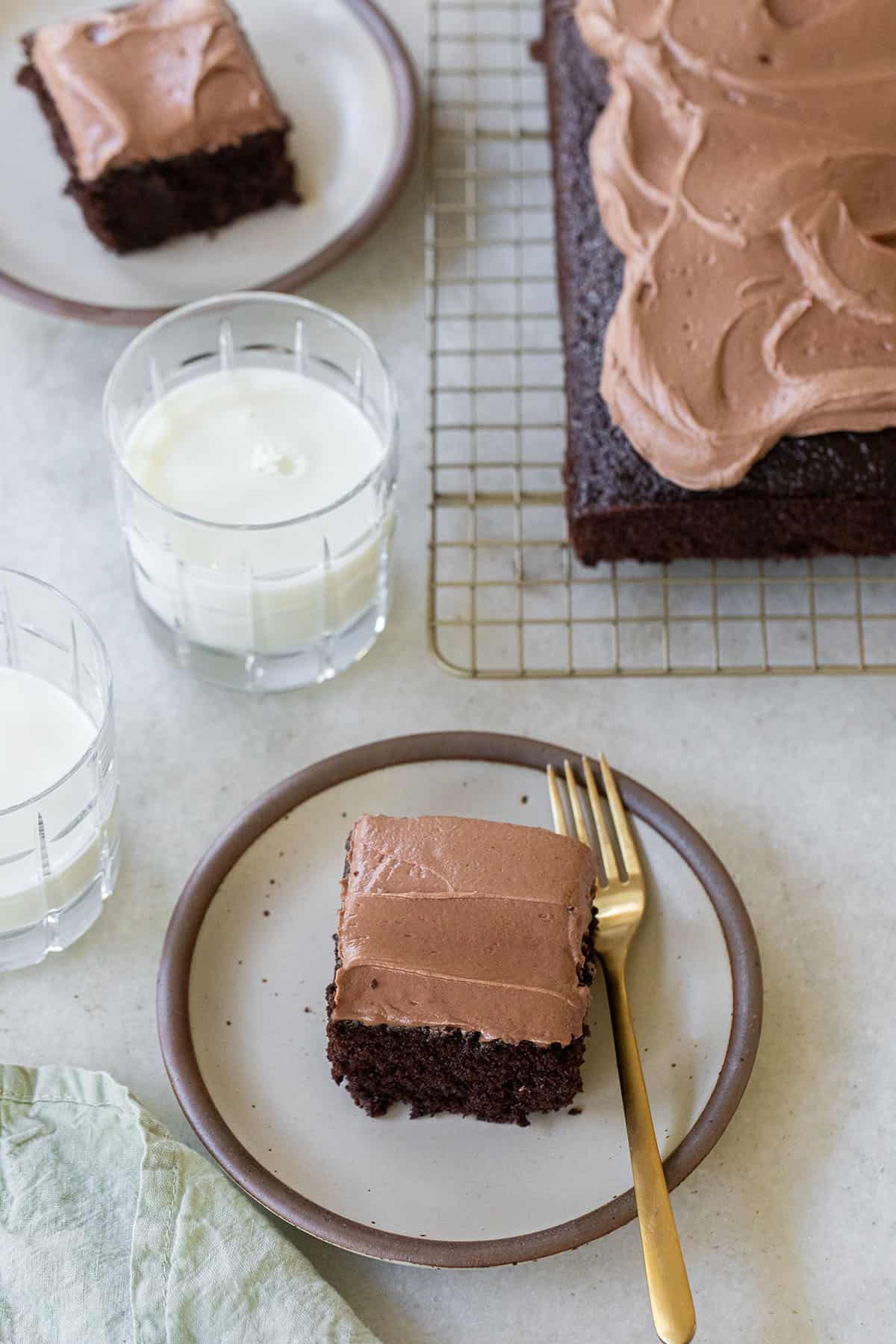 Super moist chocolate cake with frosting and milk. 