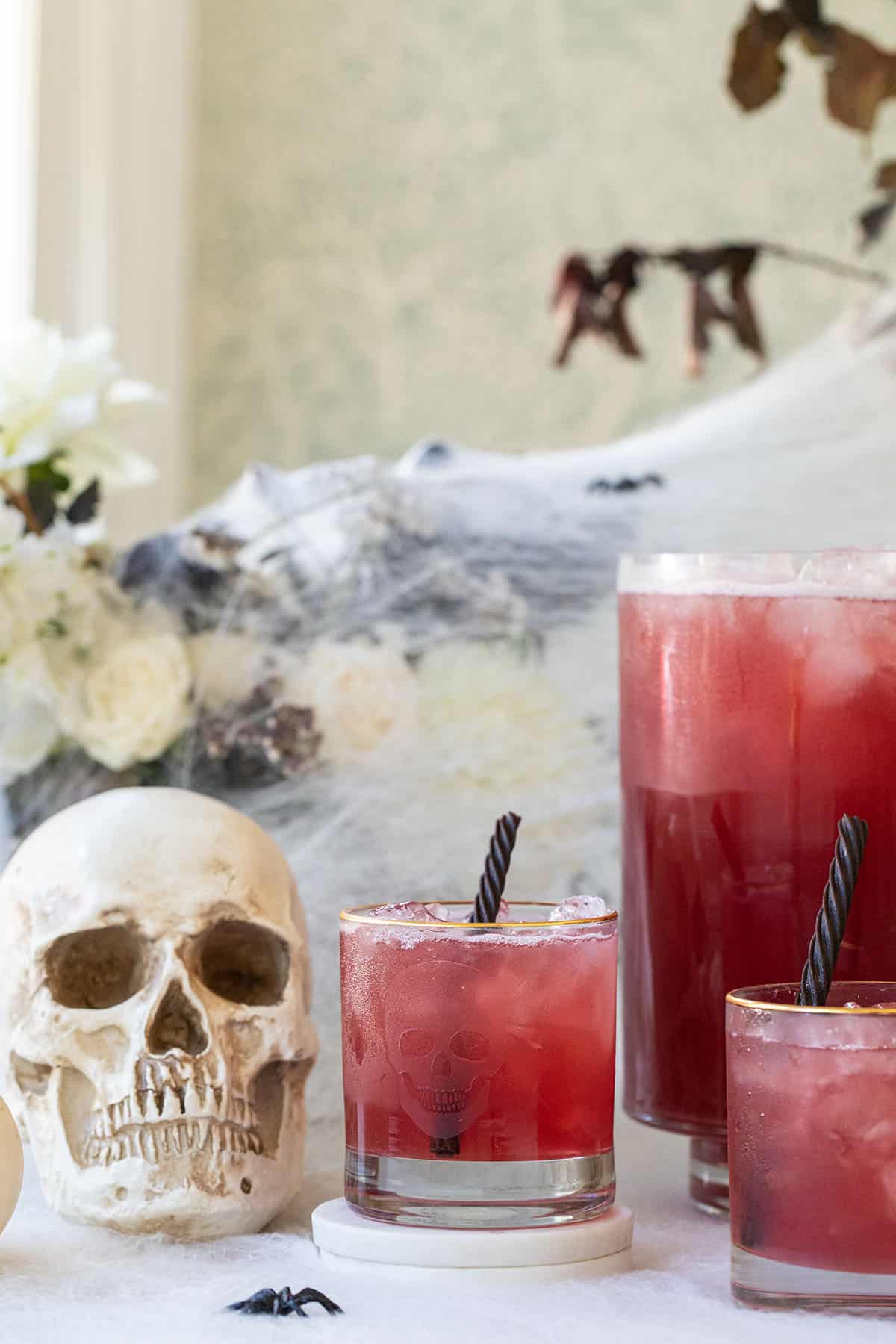 Halloween punch in a skeleton glass.