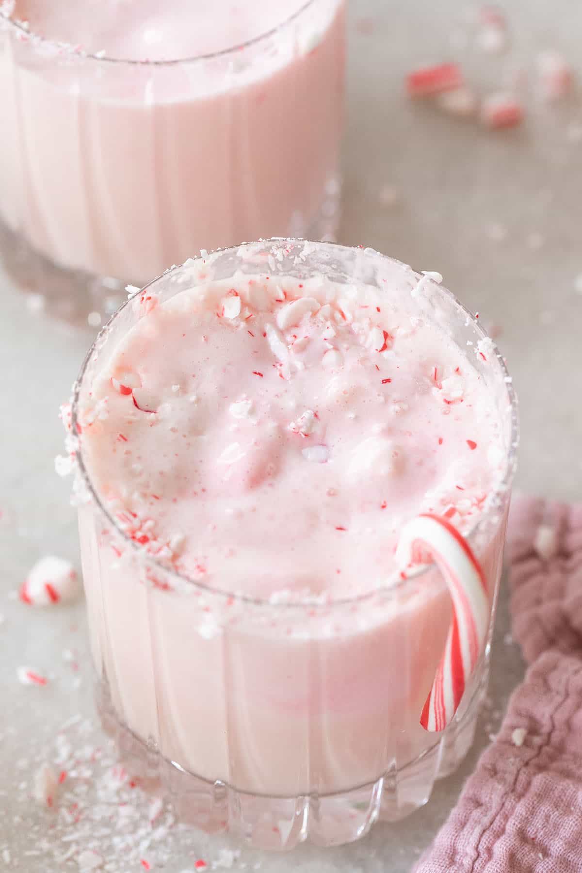 Peppermint punch recipe with candy cane.