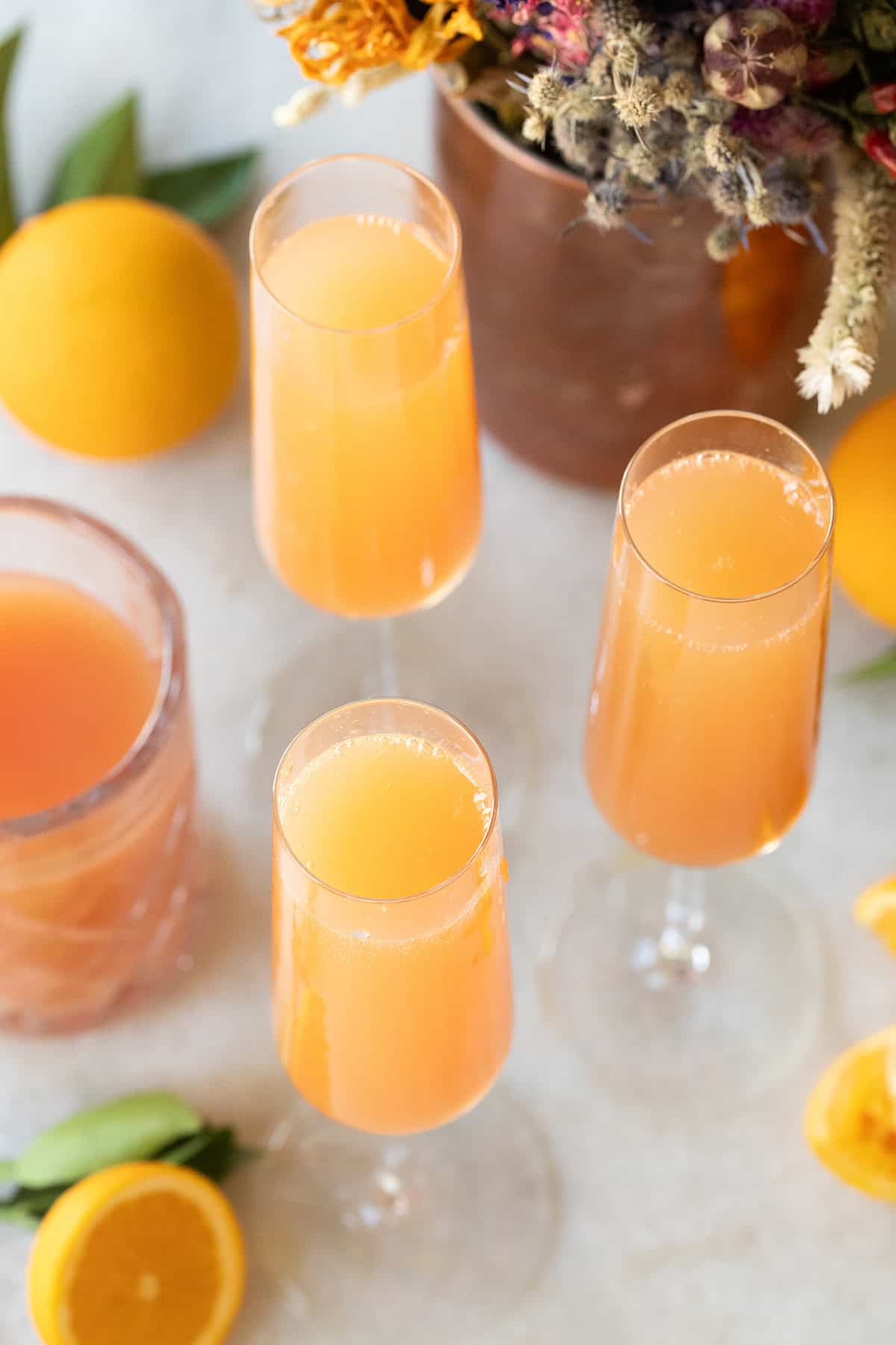 Grapefruit mimosa on a counter.