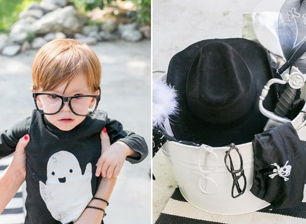 shot of toddler in a ghost costume