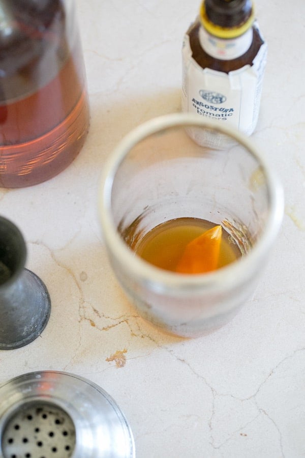 top down shot of orange peel in a glass