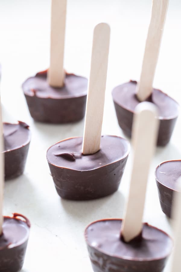 close up of hot chocolate on sticks