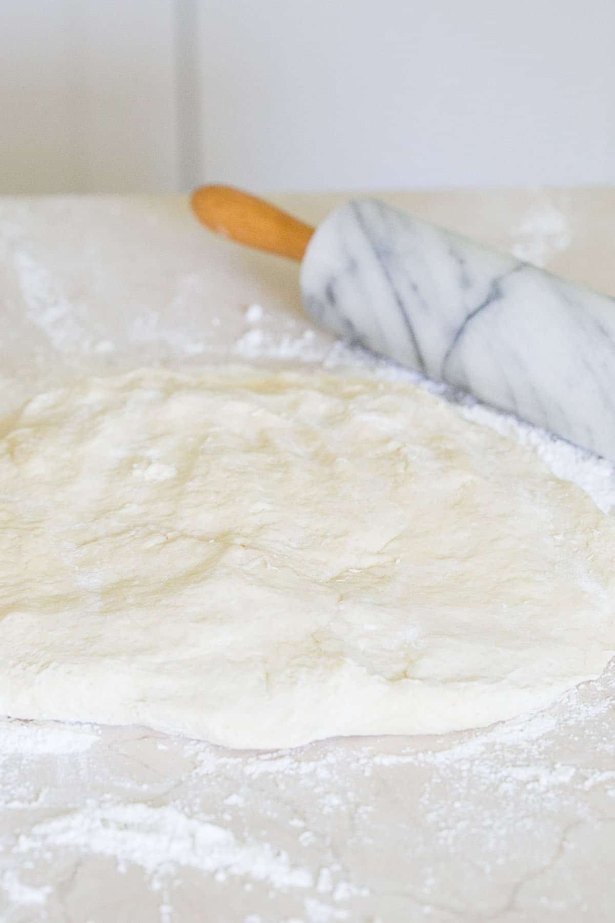 making dough for homemade beignets