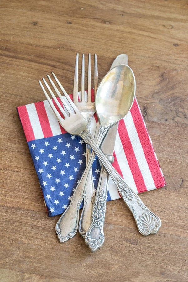 vintage silverware and an American flag napkin