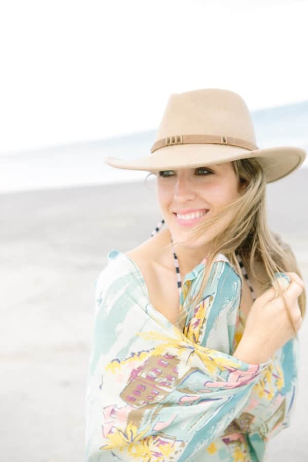 Eden Passante with a hat at the beach 