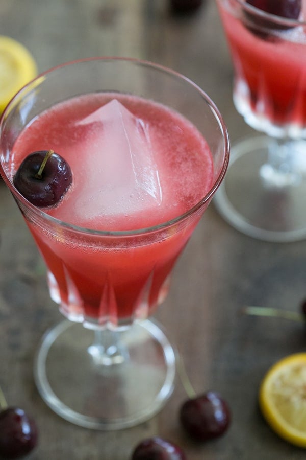 top down shot of cherry vodka cocktail in a glass