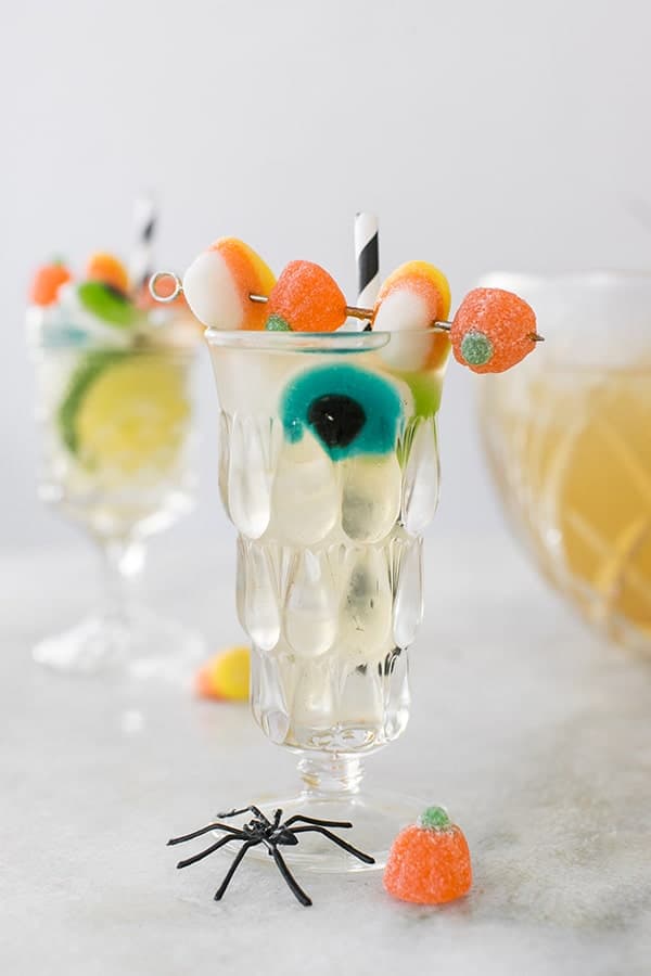 Lemongrass Halloween cocktail with Halloween candy skewers.