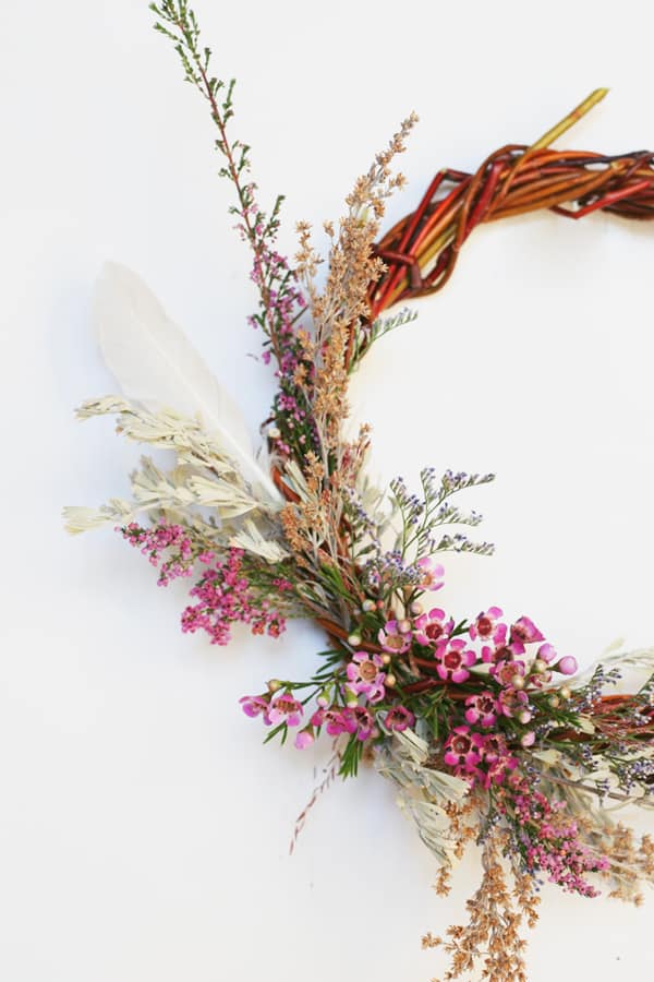 Dried flowers on a willow wreath in the snow - frequently bought