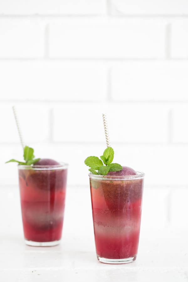 Cocktail with blueberry, rum and fresh mint.