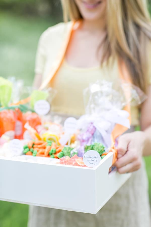 Girl holding a white old-fashioned candy box - easter basket