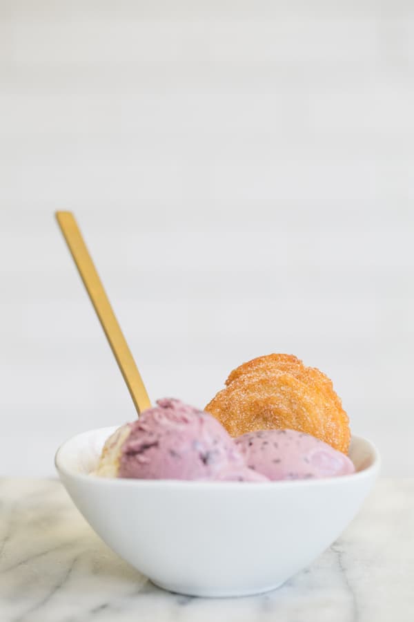 Bowl of ice cream with a homemade churros.