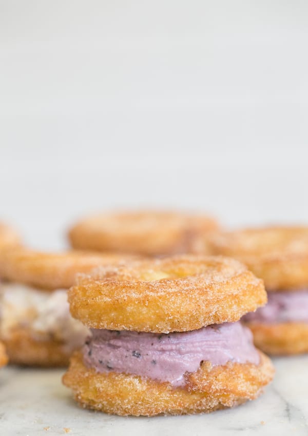 A mini ice cream sandwich made with homemade churros.