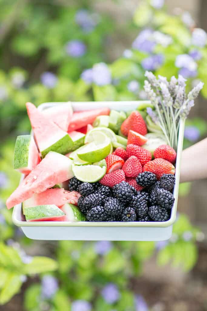 fruit sliced for an agua fresca bar