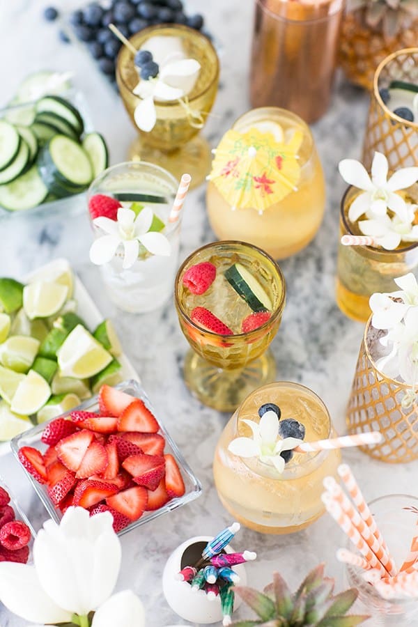 cocktails on a marble table with berries. 