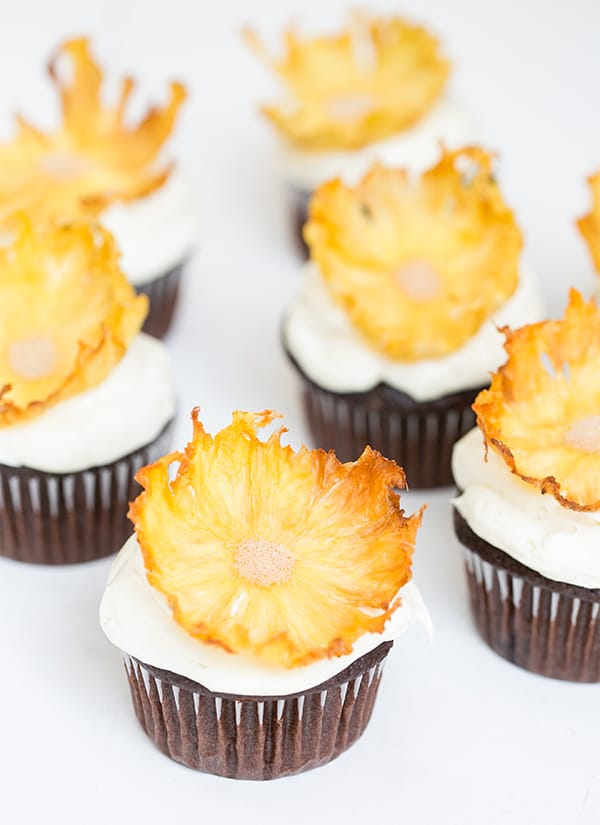 Pineapple flowers on chocolate cupcakes