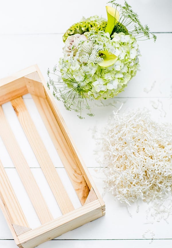 wooden gift box, flowers and shredding 