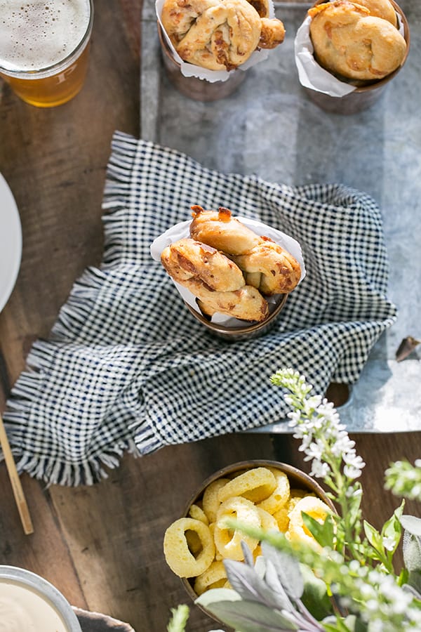 easy pretzel recipe on a table with napkin and beer