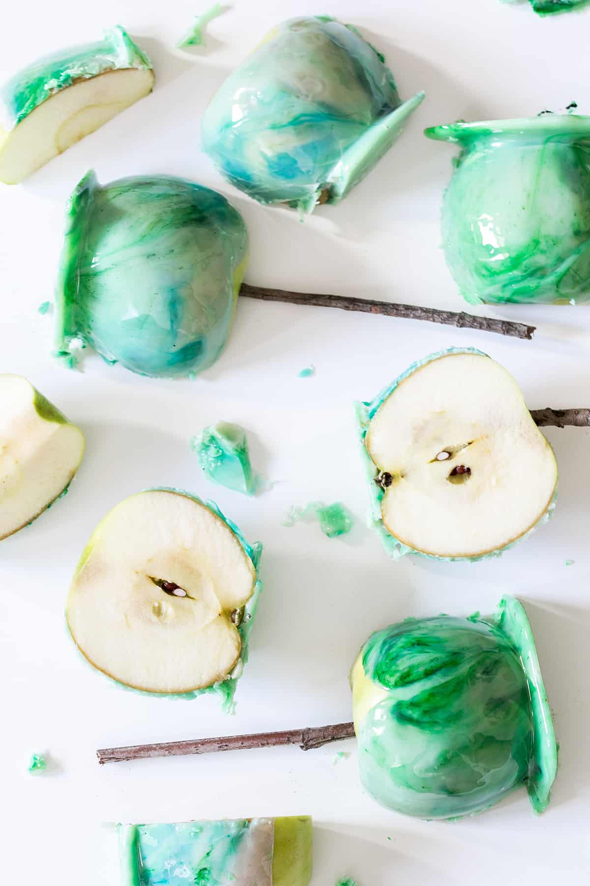 marbled candy apples on white table.