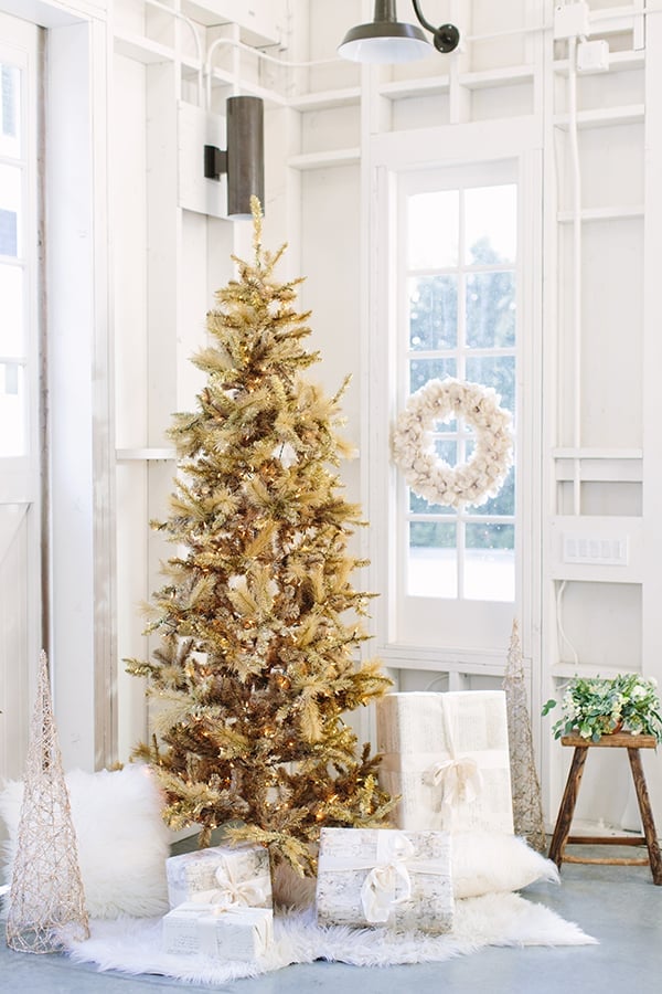 gold christmas tree in the corner