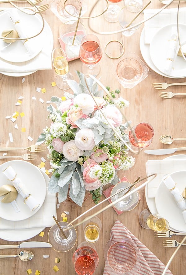 New Year's Eve Dinner table setting with flowers 