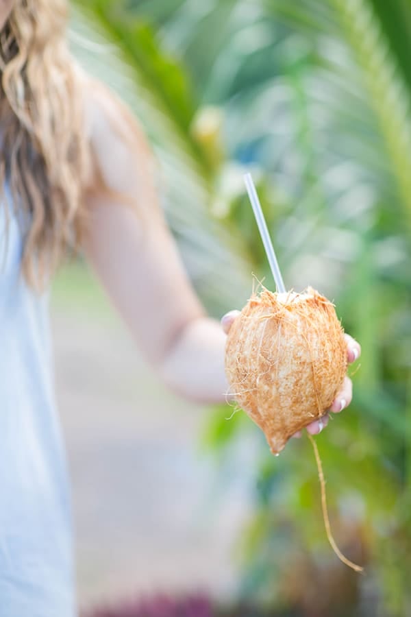 Holding a coconut for water