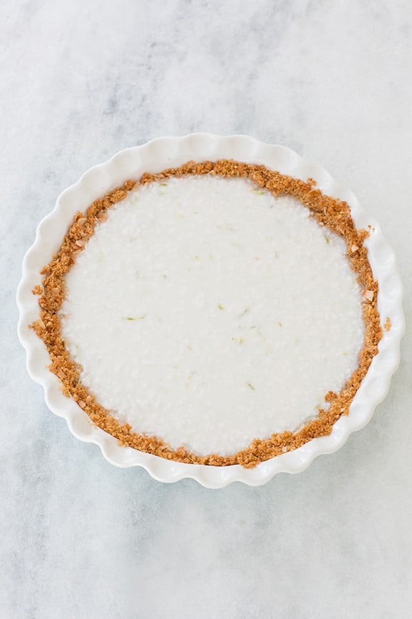 coconut key lime pie recipe on a marble table.