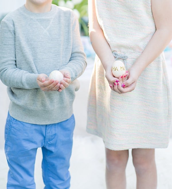 Kids holding easter eggs 