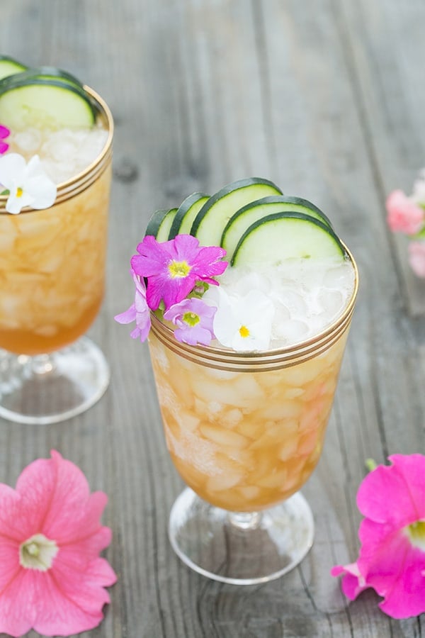 Pimm's Cup recipe with crushed ice and cucumber slices.