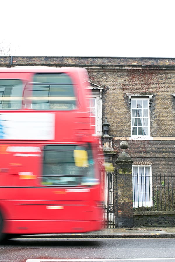 Double decker bus driving through London 