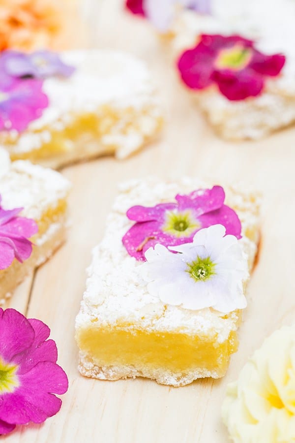 Lemon bars with edible flowers.