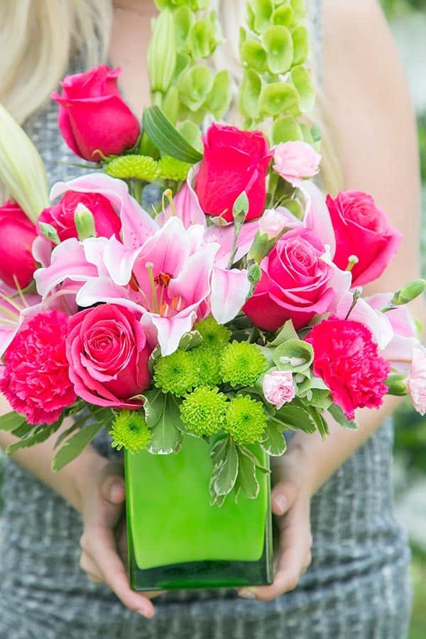 Holding Mother's Day Flowers. 