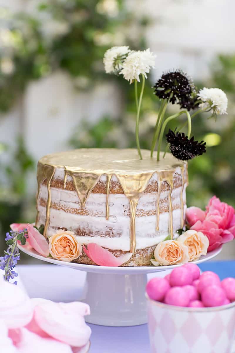 drip cake with flowers for an Alice in Wonderland tea party.