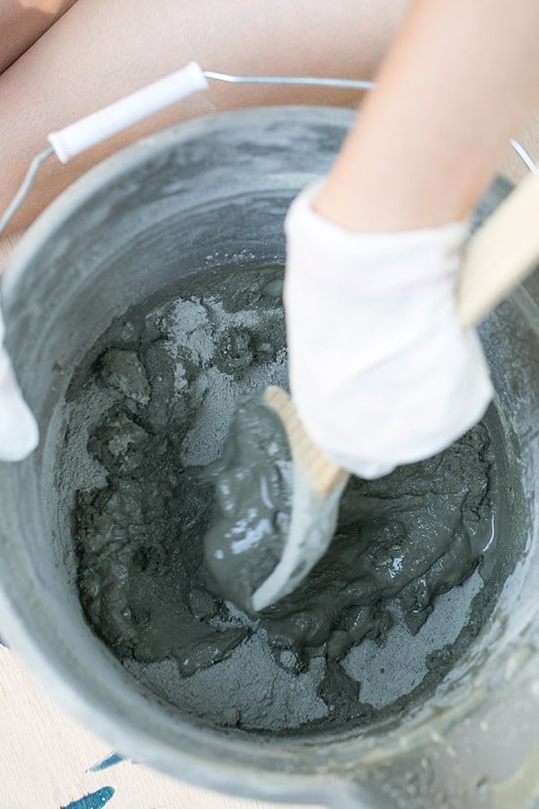concrete mix in a bowl being stirred