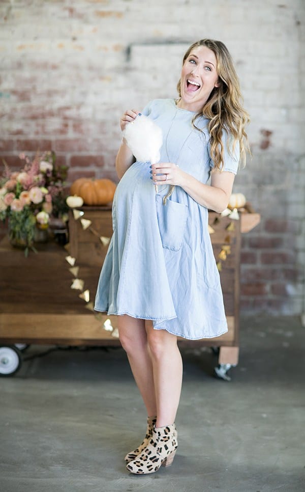 Eden Passante holding cotton candy at her baby shower - fall baby shower ideas, little pumpkin baby shower, mom to be