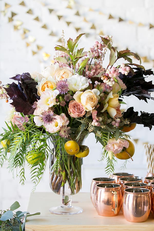 pretty floral staple piece on a table - floral arranging tips