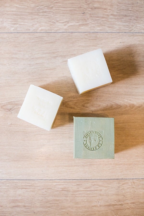 Savon de Marseille Soap on a wooden table.