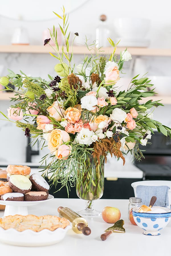 A pie party with flowers.