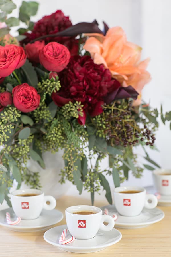 Flowers and Illy espresso in cups