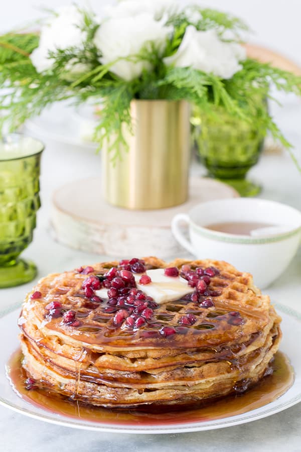 Yeast waffles with butter and pomegranates 