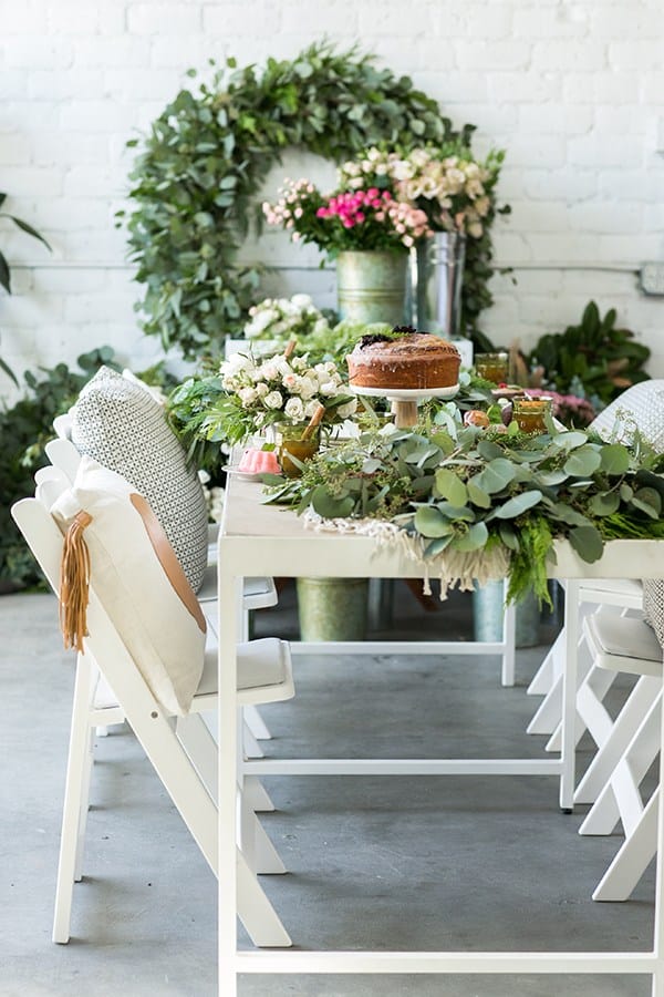 shot of table with cakes on it, at the wreath making party