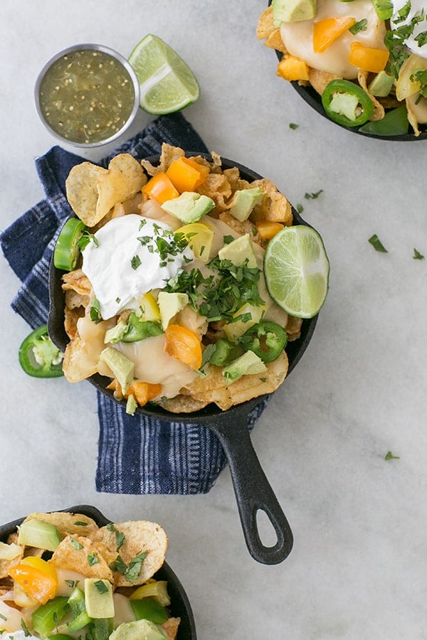 Beer nachos with cheese, sour cream and Kettle Chips