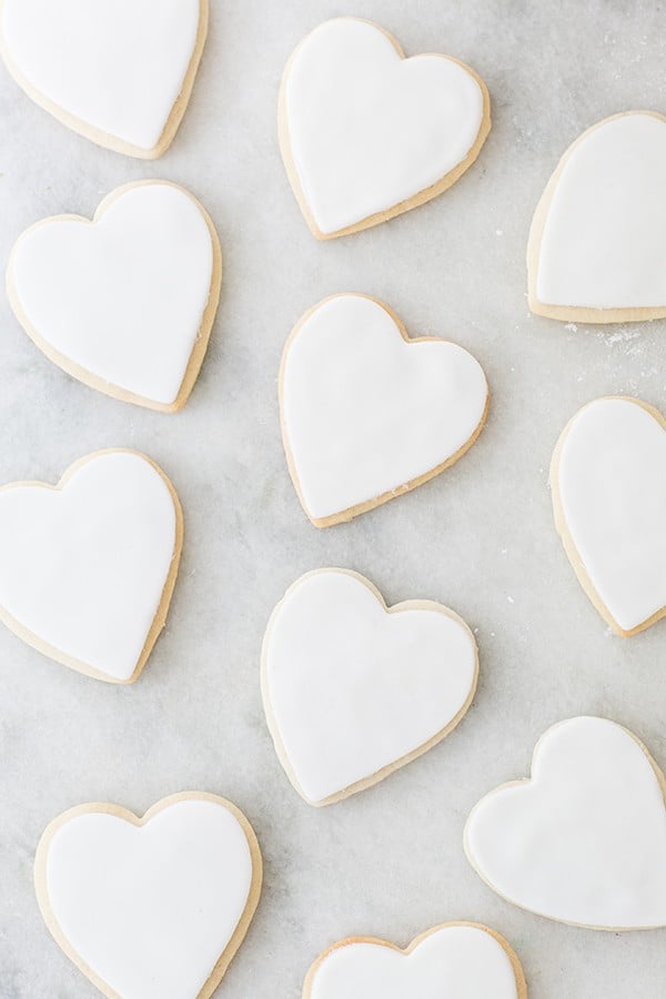 overhead shot of frosted sugar cookies, before being painted