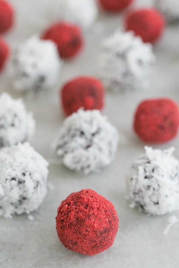 close up of strawberry covered coconut truffles