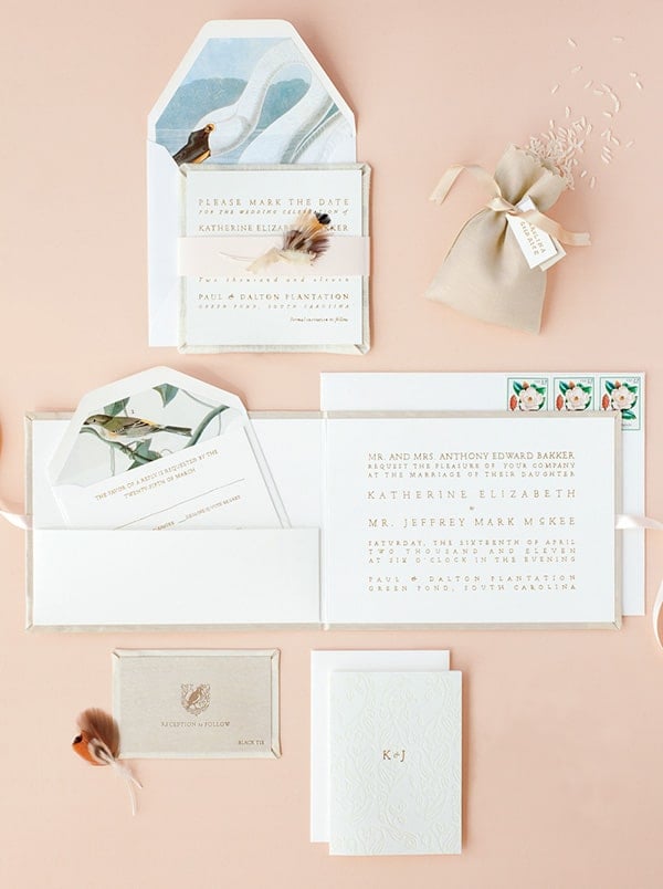 Wedding invitations on a pink background. 